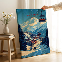 La Tania Wall Art Ski Print showcasing a beautiful alpine village and ski slopes in a cozy interior setting.