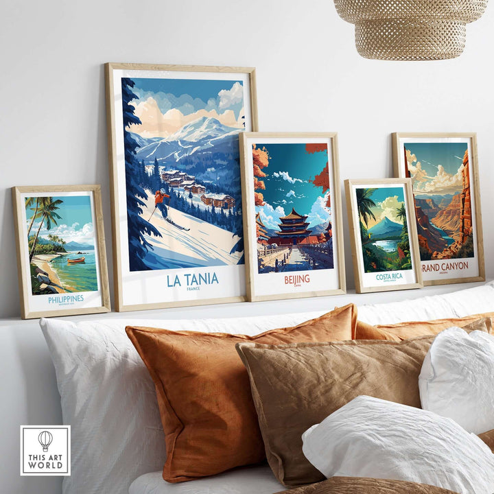 La Tania ski poster among framed travel posters on a stylish wall, showcasing nature's beauty and adventure.