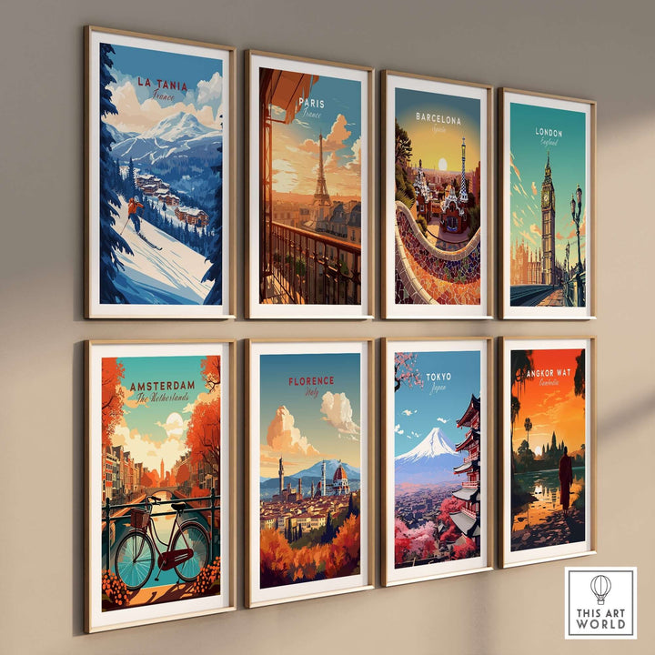 Nine travel-inspired prints featuring La Tania, Paris, Barcelona, London, Amsterdam, Florence, Tokyo, and Angkor Wat on a gallery wall.