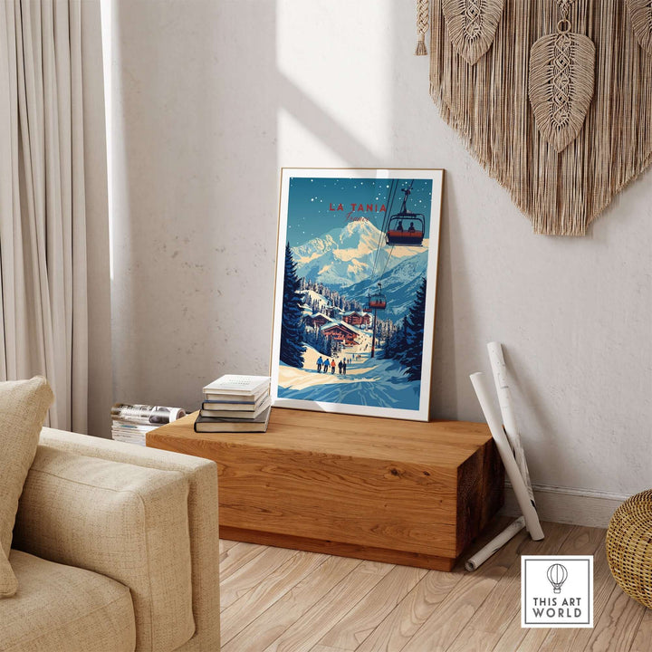 La Tania Wall Art Ski Print showcasing a snowy alpine scene with a ski lift and mountain backdrop in a stylish living room.