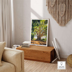 Lahaina Banyan Tree Poster displayed in a cozy interior with natural decor and wooden furniture.
