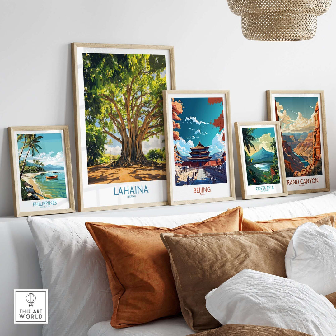 Lahaina Banyan Tree wall art displayed among other travel-themed prints on a stylish sofa.