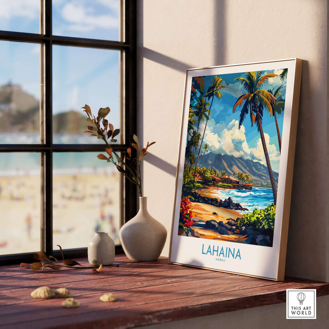 Lahaina poster featuring vibrant tropical landscape, displayed in a sunlit room with beach view.