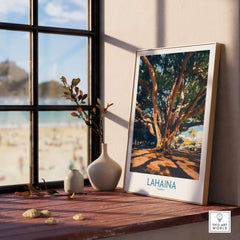 Lahaina Travel Poster featuring a banyan tree displayed on a windowsill with a beach view in the background.