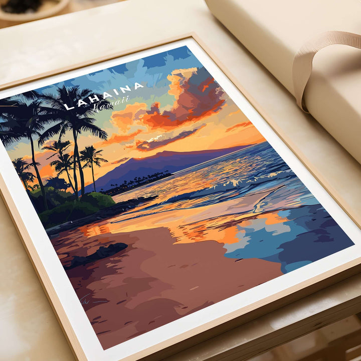 Lahaina wall art featuring a vibrant sunset over Hawaii’s coastline with palm trees and mountains.