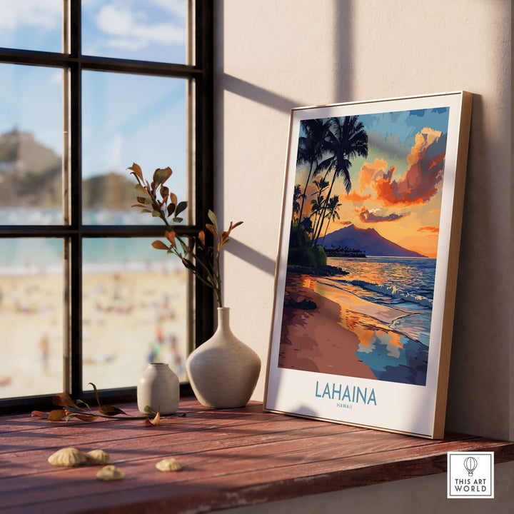 Lahaina wall art print displayed on a wooden table with a beach view, featuring vibrant colors and tropical scenery.