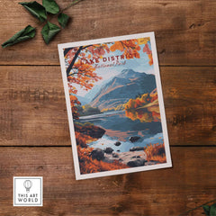 Lake District England Poster featuring a picturesque view of autumn foliage and tranquil waters.