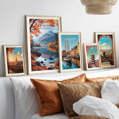 Lake District England Poster displayed among framed travel posters in a cozy home setting.