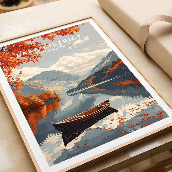 Lake District England travel poster featuring a serene lake, autumn leaves, and a boat surrounded by picturesque mountains.