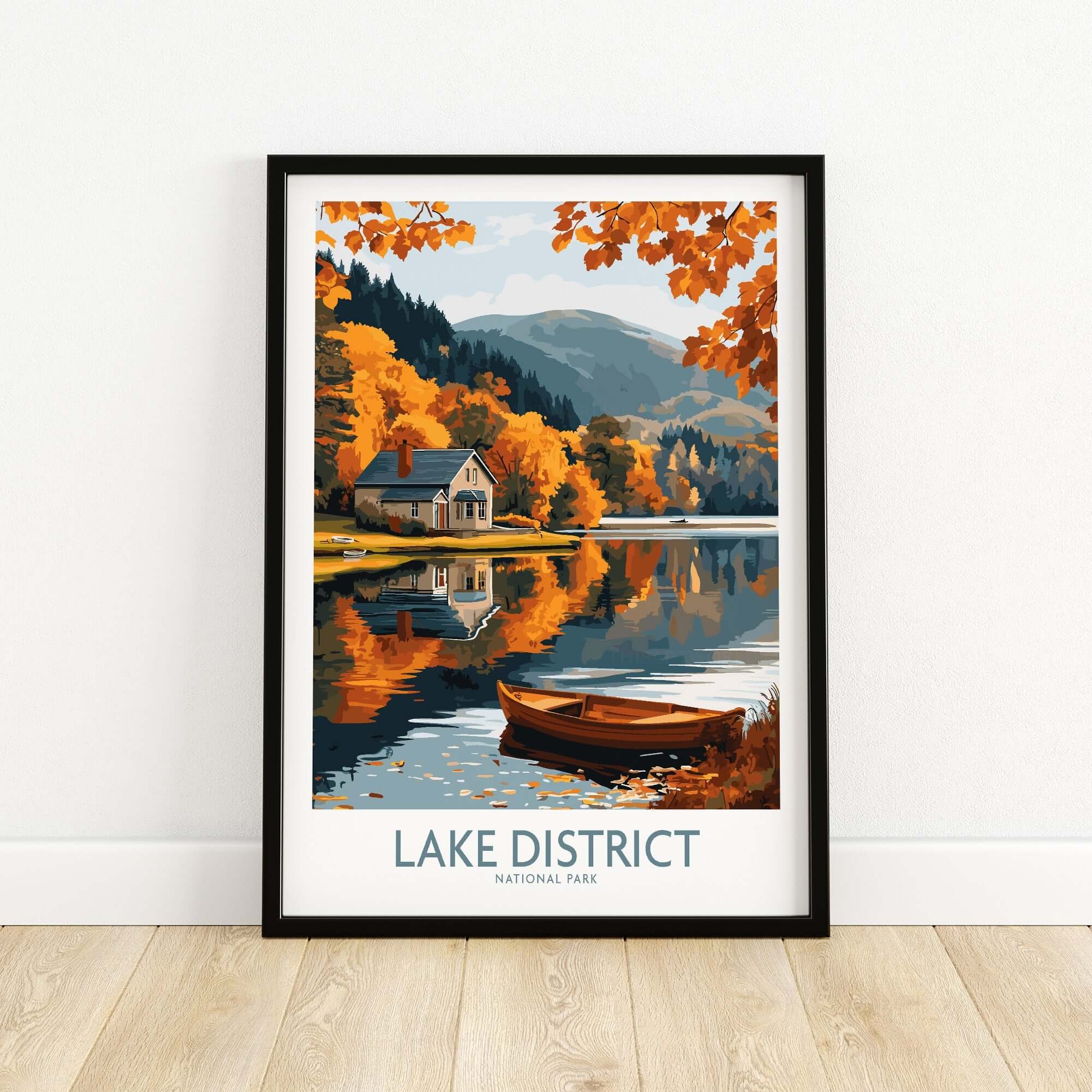 Lake District England Travel Print featuring a scenic lake, autumn foliage, and a boat.