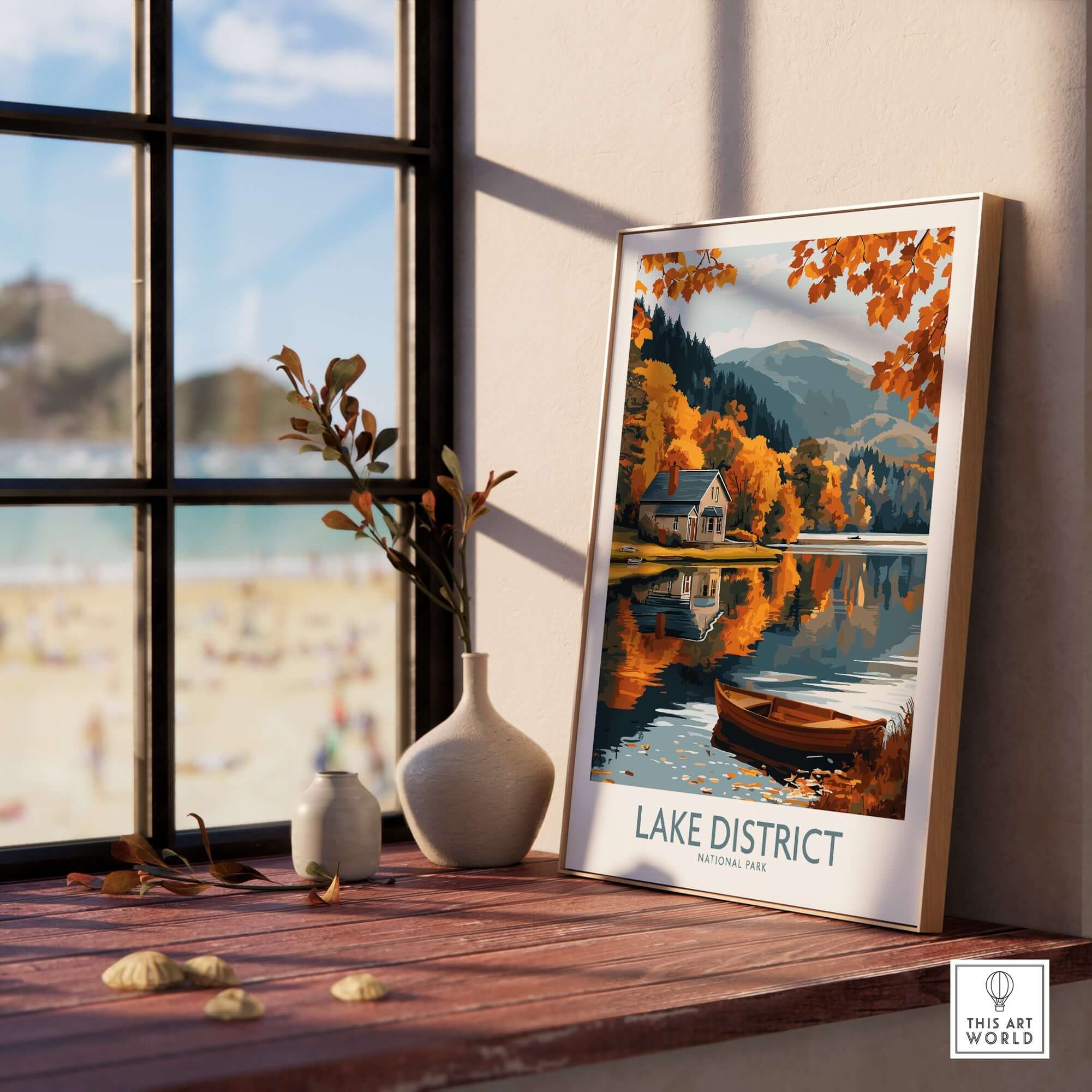Lake District England Travel Print showcasing beautiful autumn scenery and reflections in water by a window.