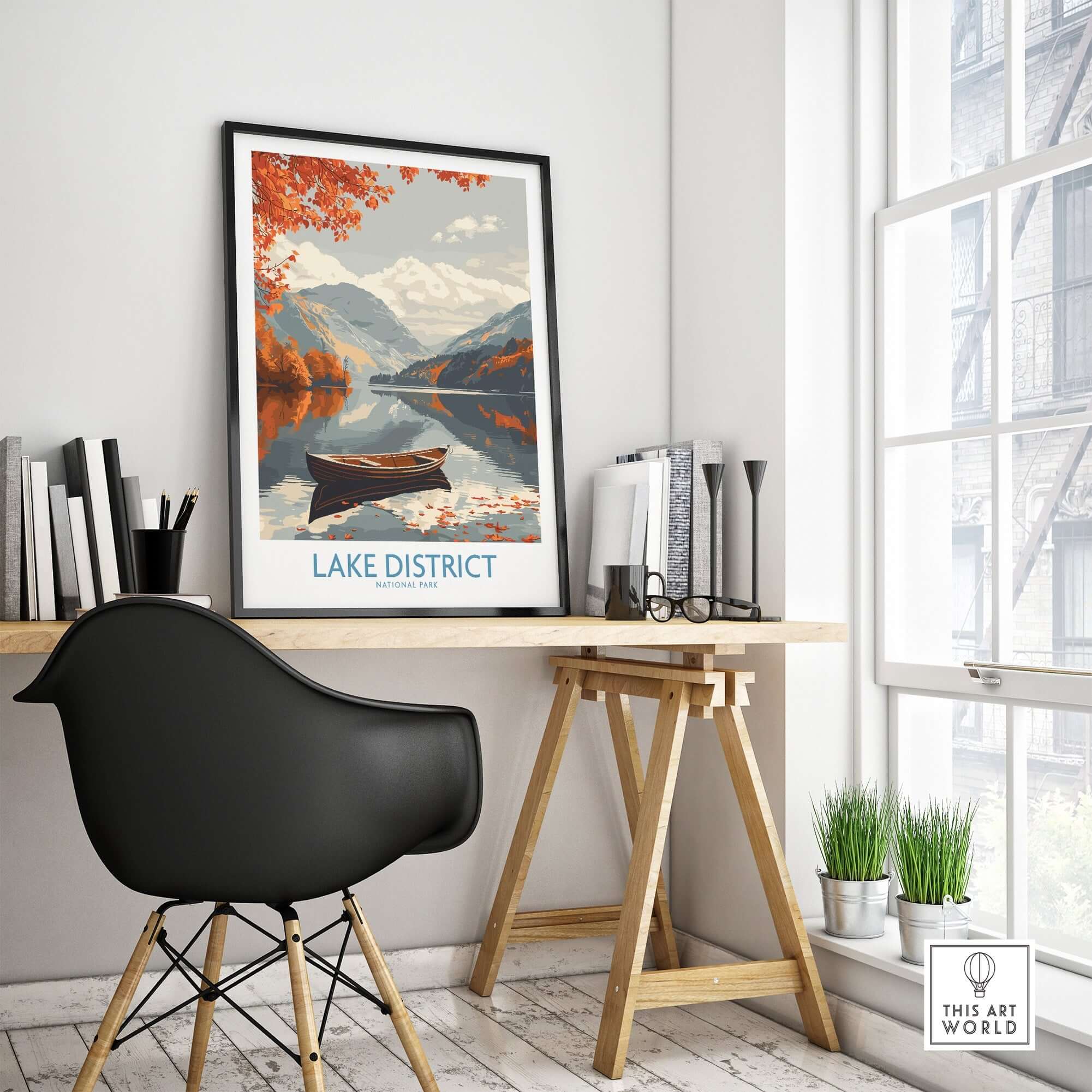 Lake District England Wall Art displayed in a modern workspace with a black chair and natural light.