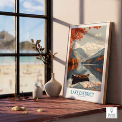 Lake District England Wall Art featuring a boat on a serene lake surrounded by autumn foliage.