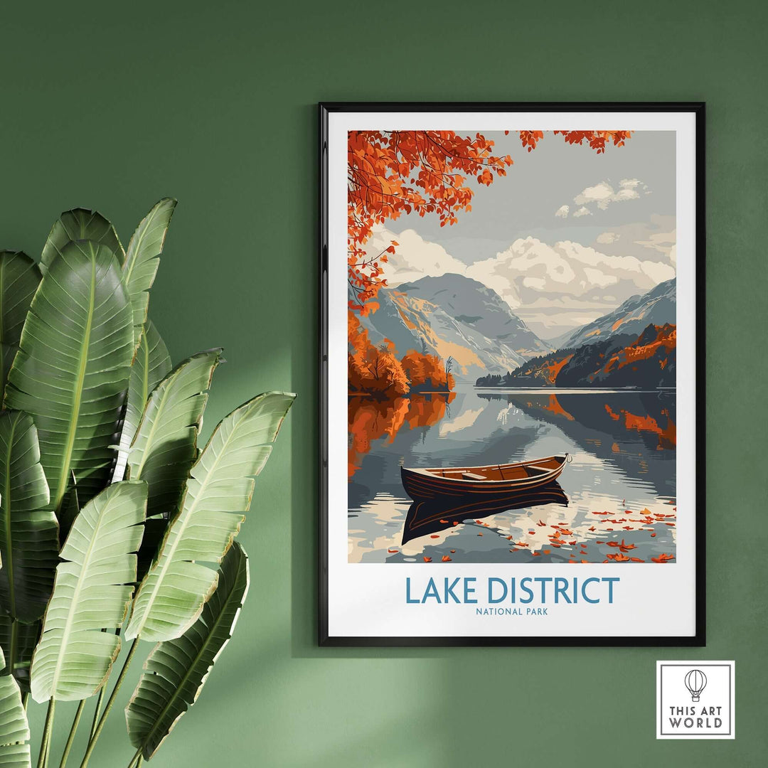 Lake District wall art featuring serene lake and mountains, framed and displayed against a green wall with plants.