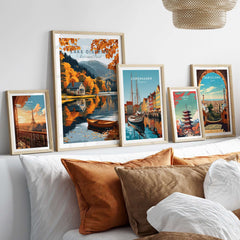 Lake District Poster alongside travel posters in a stylish living room decor setting.