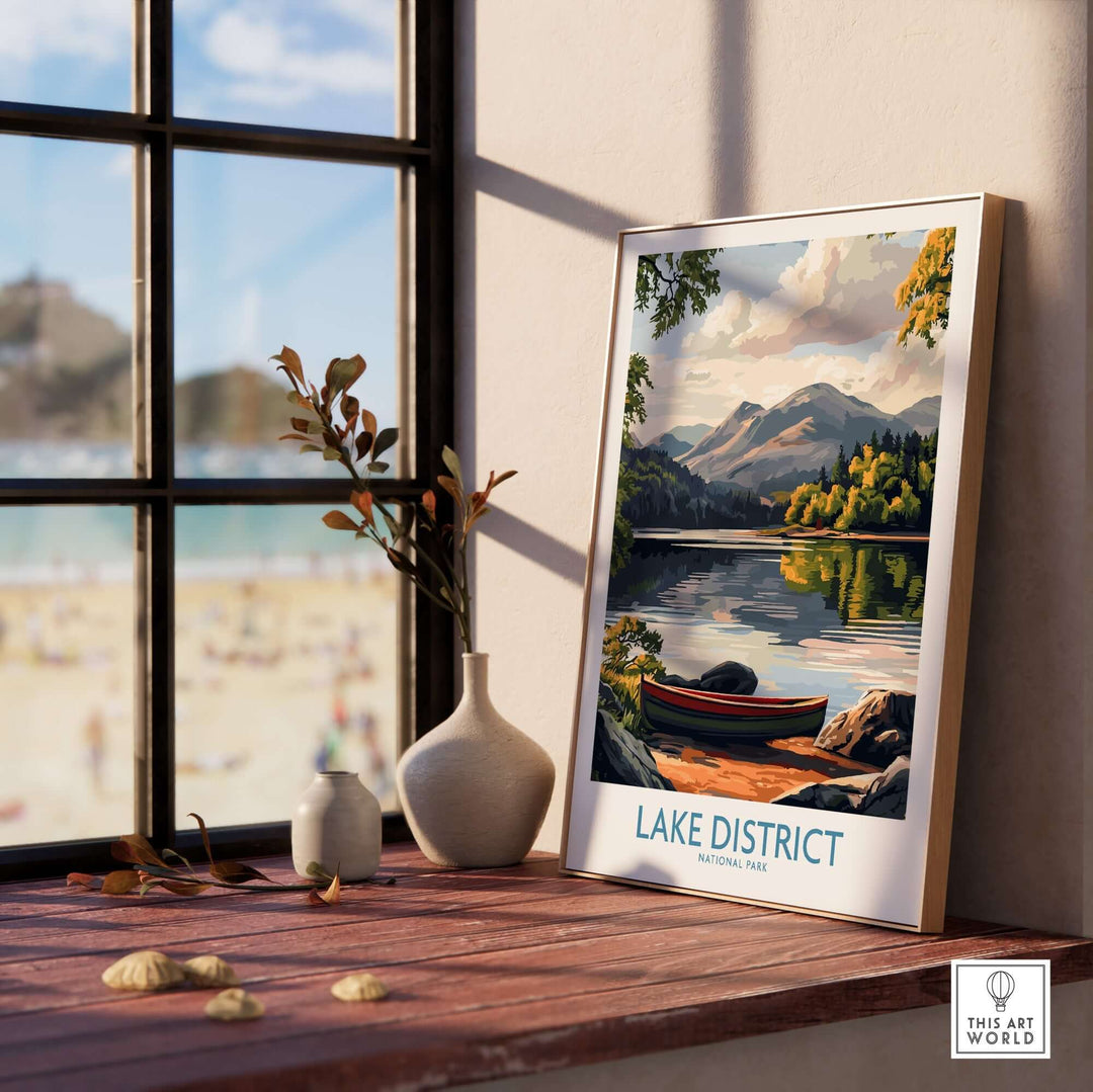 Beautiful Lake District print featuring serene landscapes and vibrant colors, displayed on a windowsill.