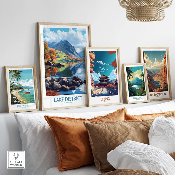 Lake District travel poster among framed travel posters of Philippines, Beijing, Costa Rica, and Grand Canyon on a stylish wall.