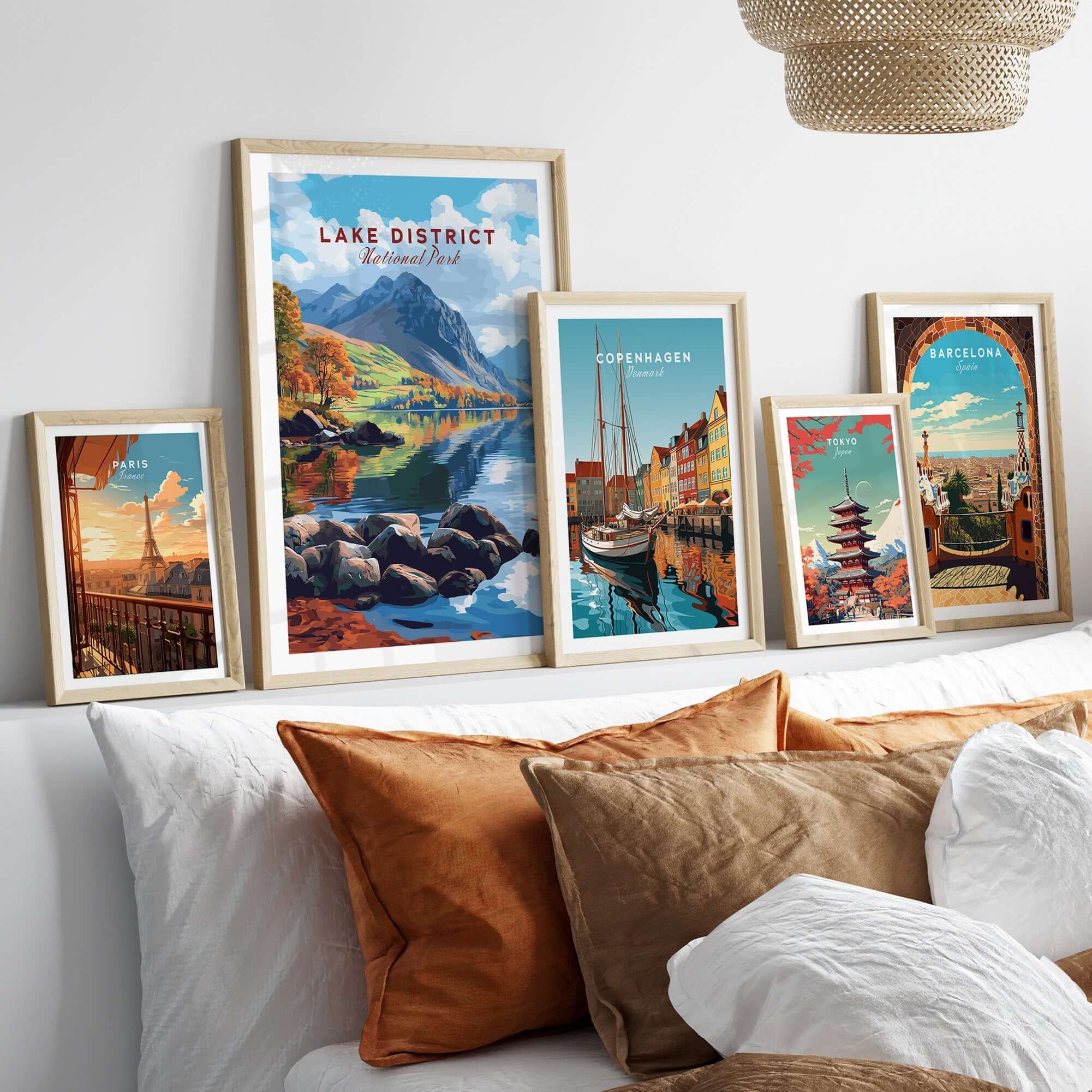 Lake District Travel Print displayed among framed travel art prints in a cozy home setting.