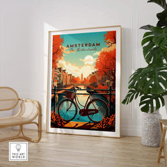 Amsterdam print featuring vibrant sunset colors, canals, and a bike in a stylish living room setting.