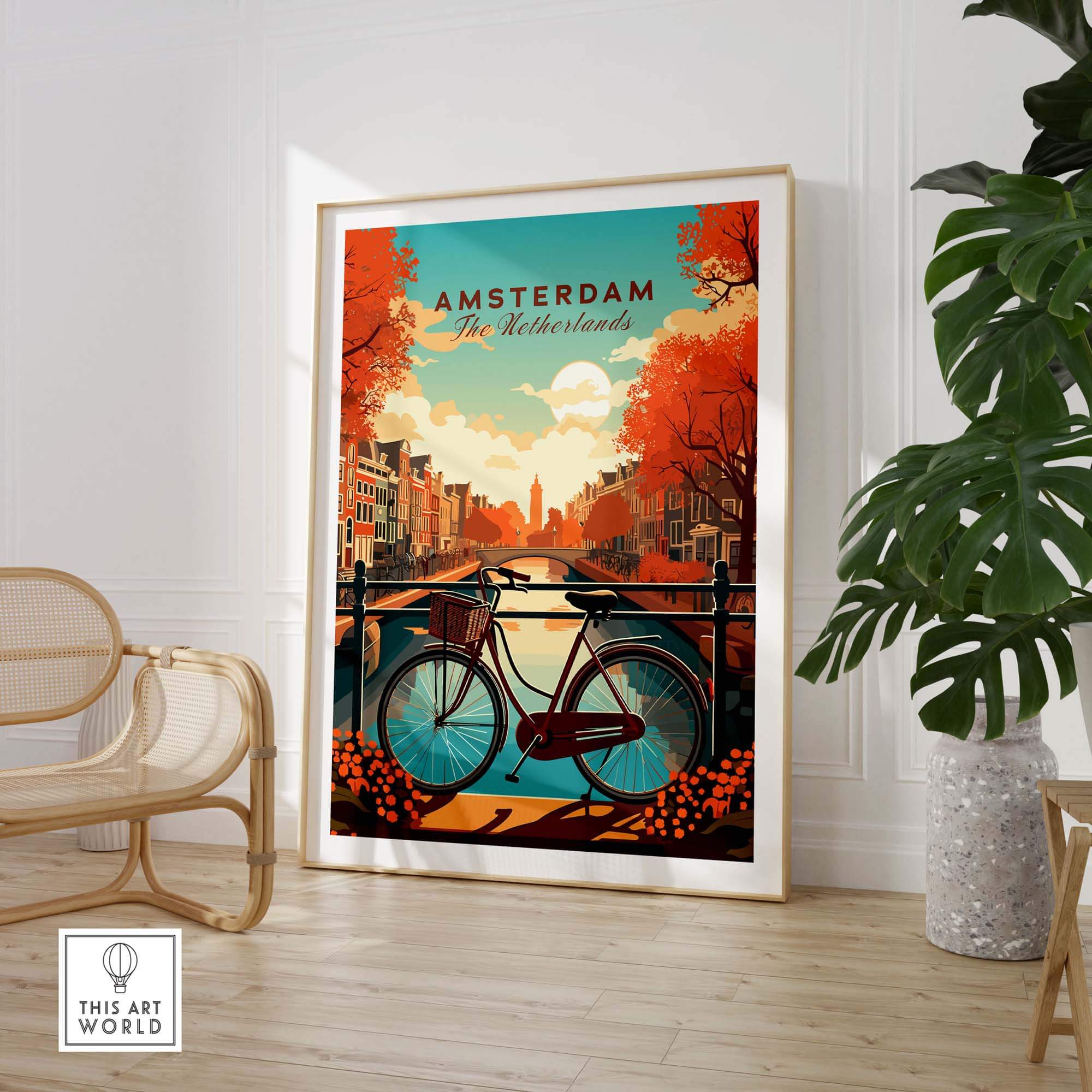 Amsterdam print featuring vibrant sunset colors, canals, and a bike in a stylish living room setting.