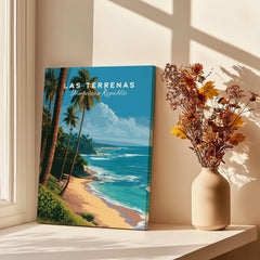 Las Terrenas Dominican Republic travel poster with palm trees, beach, and ocean, displayed on windowsill with dried flowers.