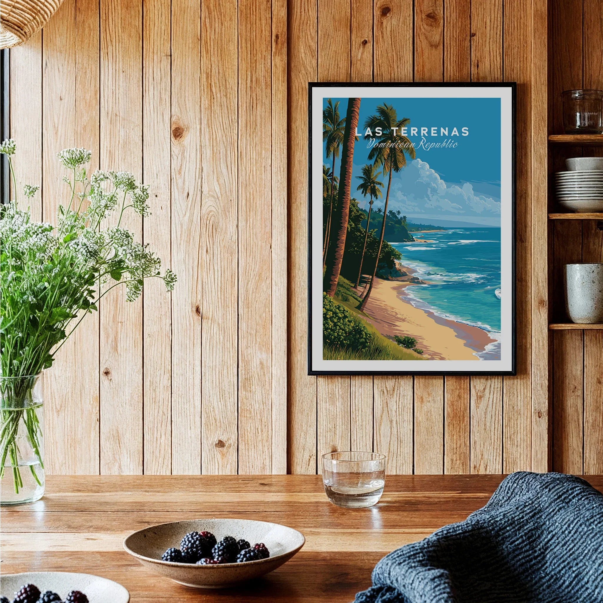 Las Terrenas Dominican Republic travel poster with palm trees, beach, and ocean, framed on wood wall