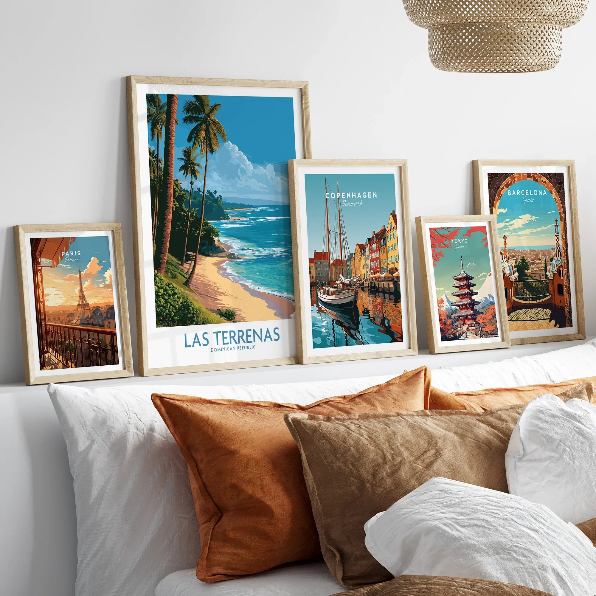 Framed travel posters of Paris, Las Terrenas, Copenhagen, Tokyo, and Barcelona for wall art decor