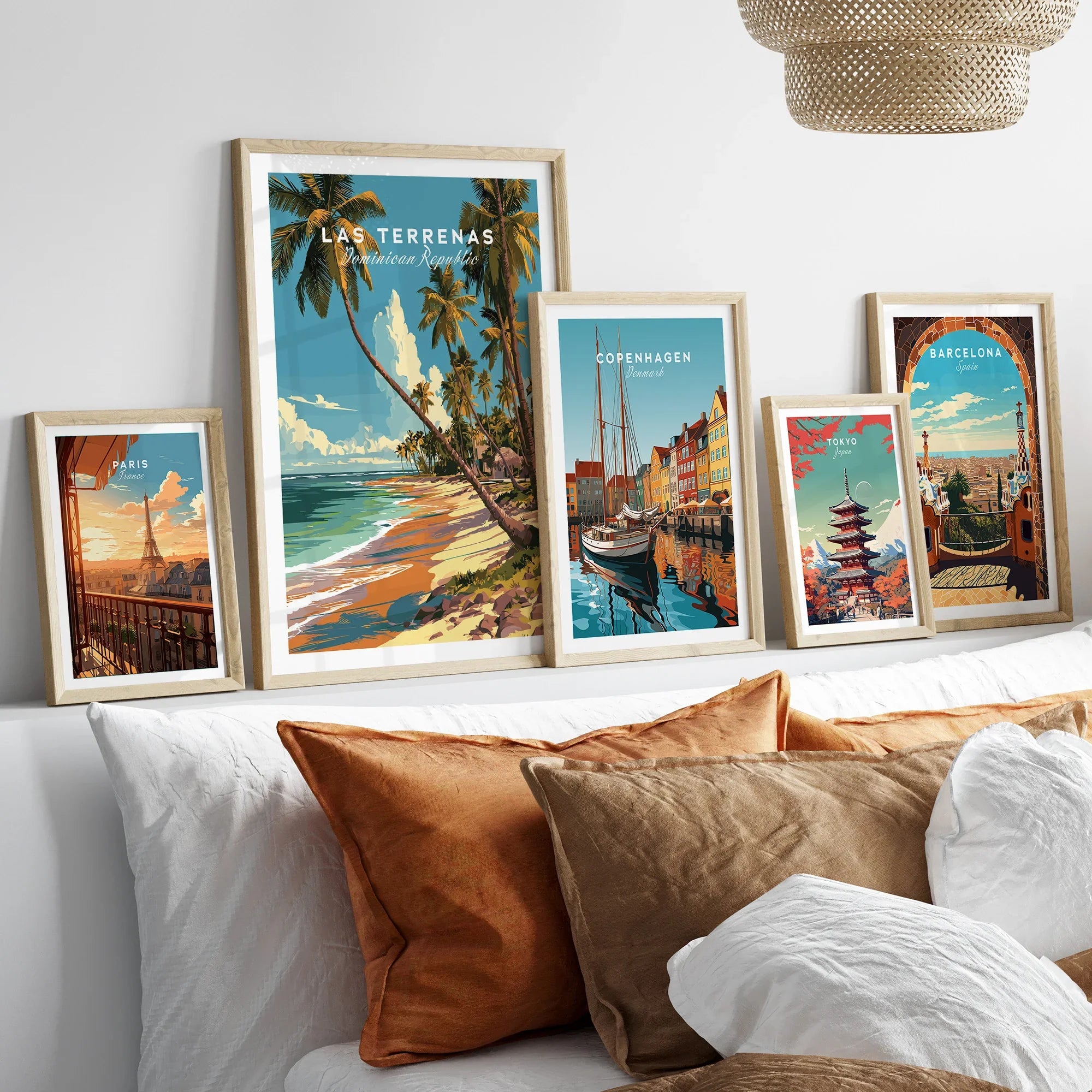 Framed travel posters of Paris, Las Terrenas, Copenhagen, Tokyo, and Barcelona for wall art decor