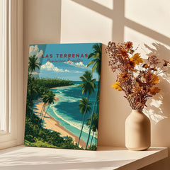 Las Terrenas Dominican Republic travel poster with palm trees, beach, and ocean, displayed on windowsill with dried flowers.