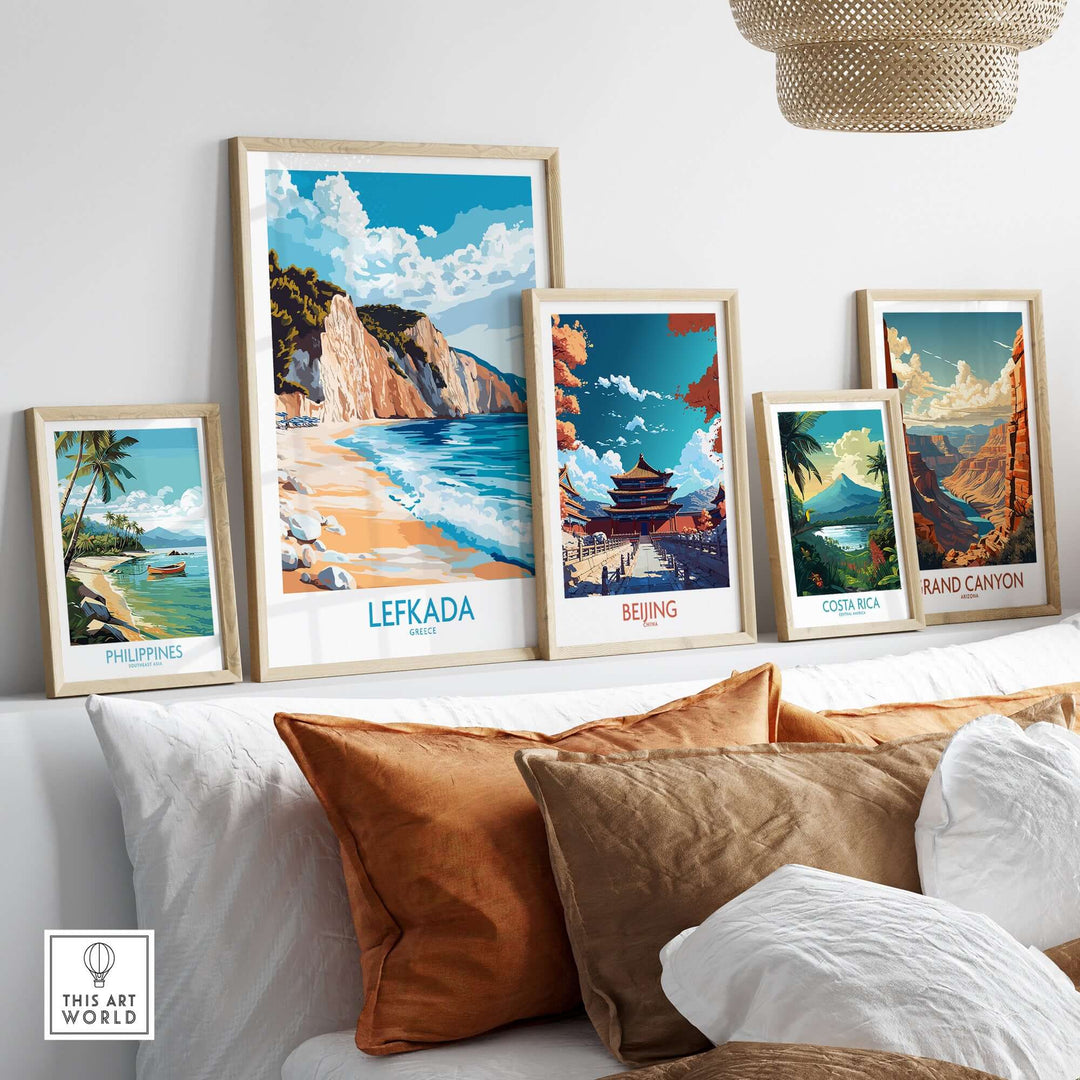 Lefkada wall art print showcasing a serene Greek beach, surrounded by other travel-themed prints on a cozy sofa.