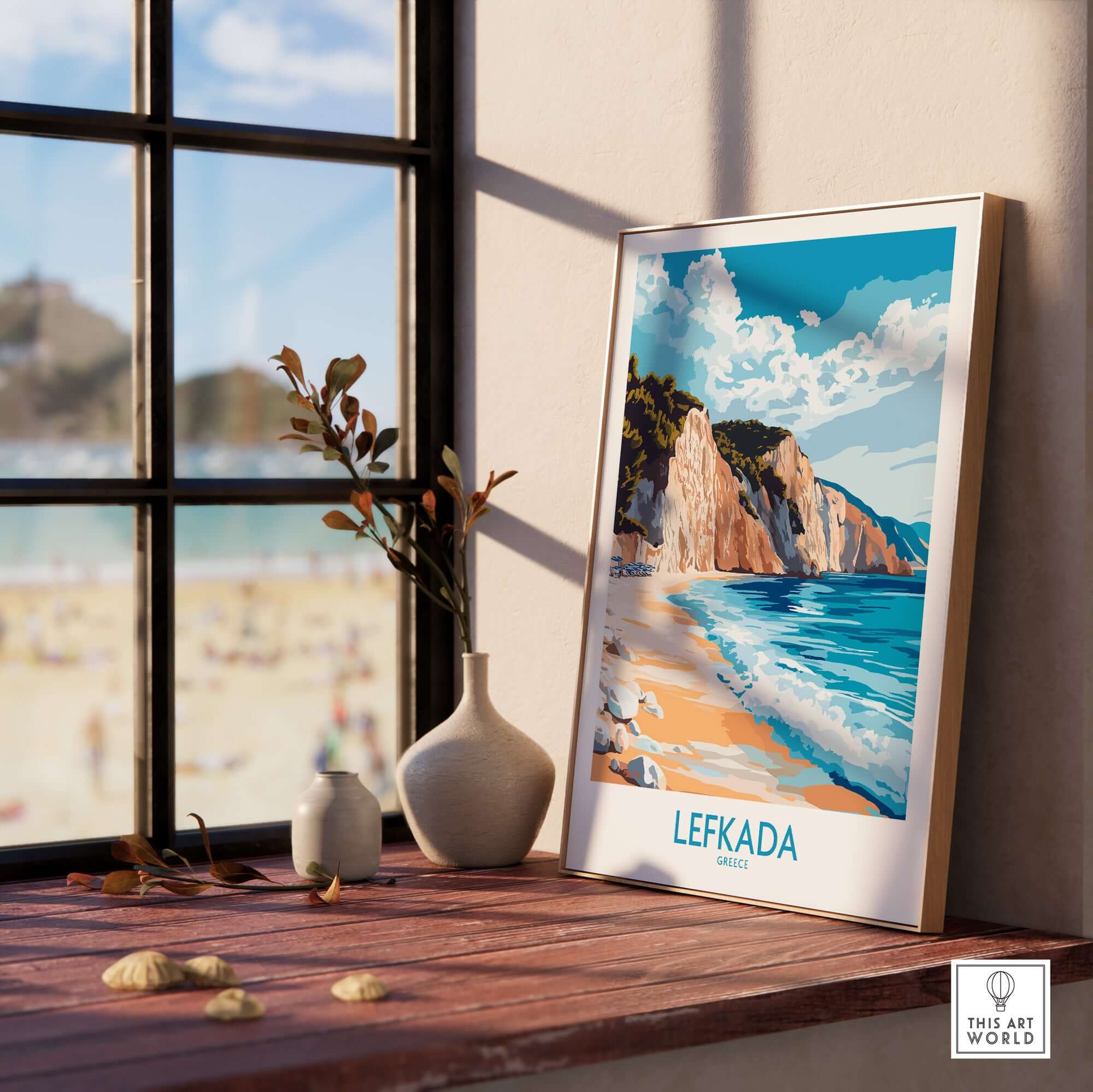 Lefkada Wall Art Print displayed by a window, showcasing a serene Greek beach scene in vibrant colors.