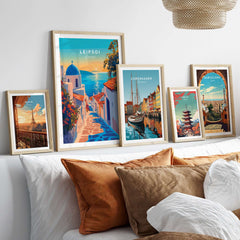 Leipsoi Wall Art Greece displayed on a wall with other city artworks, showcasing vibrant coastal scenery.