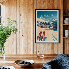 Les 2 Alpes Art Ski Print showcasing vibrant skiing scene in a cozy wooden interior setting.