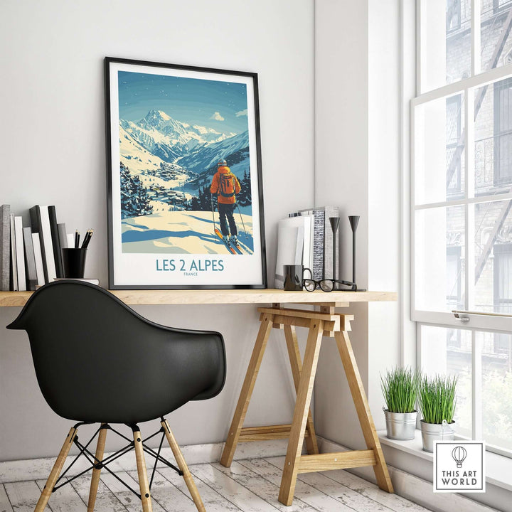 Les 2 Alpes poster displayed in a modern office, showcasing stunning mountain views and a skier against a vibrant backdrop.