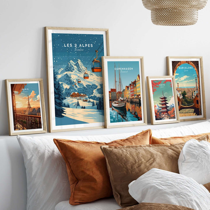 Framed Les 2 Alpes ski print among other travel-themed art, showcasing a stylish home decor setup.