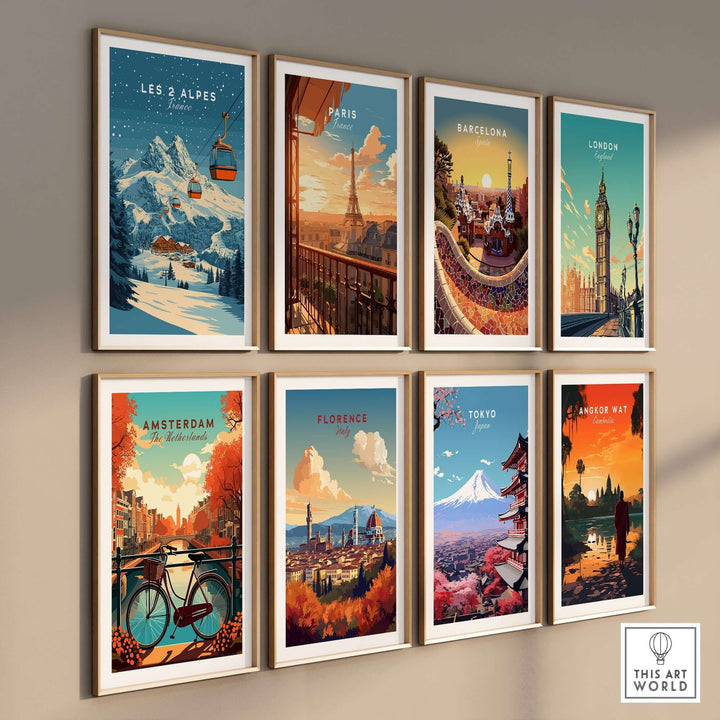 Colorful travel prints on a wall featuring iconic cities including Les 2 Alpes, Paris, Barcelona, and more.