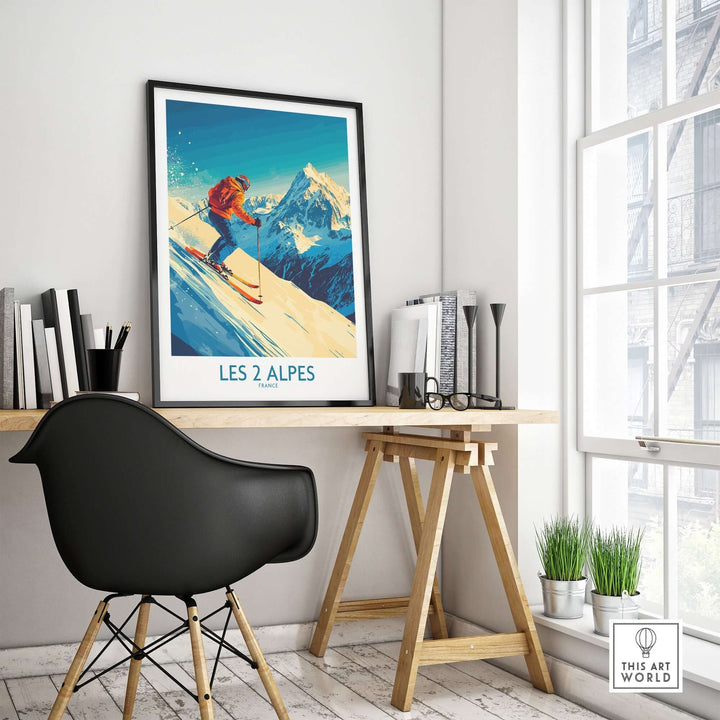 Les 2 Alpes wall art ski poster displayed in a modern workspace with a stylish chair and desk.