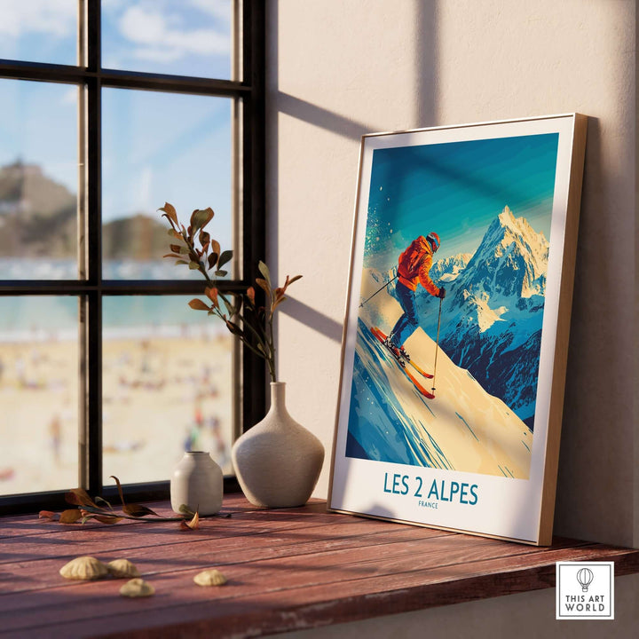 Les 2 Alpes ski poster displayed in a stylish room, showcasing vibrant mountain scenery and a skier in action.