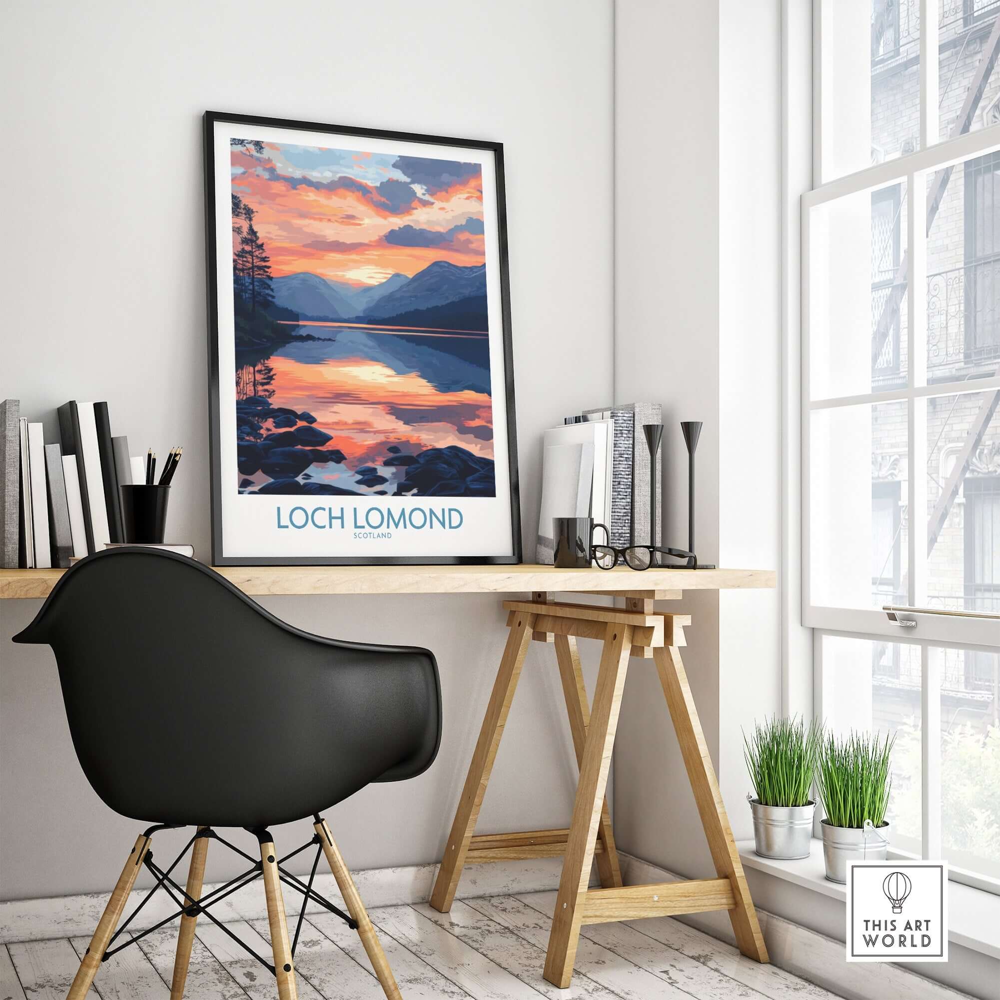 Loch Lomond Art Print displayed on a wall above a modern desk in a stylish room.