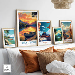 Loch Lomond Poster Scotland displayed among framed travel posters on a wall, showcasing nature's beauty.