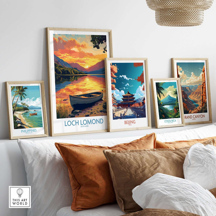 Colorful art prints of Loch Lomond, Philippines, Beijing, Costa Rica, and Grand Canyon displayed on a wall.