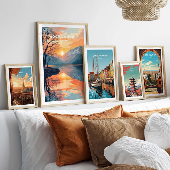 Loch Lomond print displayed among other vibrant travel art prints on a stylish bed, highlighting Scotland's beauty.