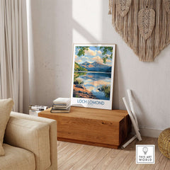 Loch Lomond Scotland Travel Poster displayed in a stylish living room setting with natural decor.