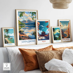 Loch Lomond Scotland Travel Poster displayed among various travel posters on a stylish shelf.