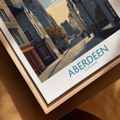 Aberdeen Scotland travel poster wall art print featuring city street scene with historic buildings and autumn trees
