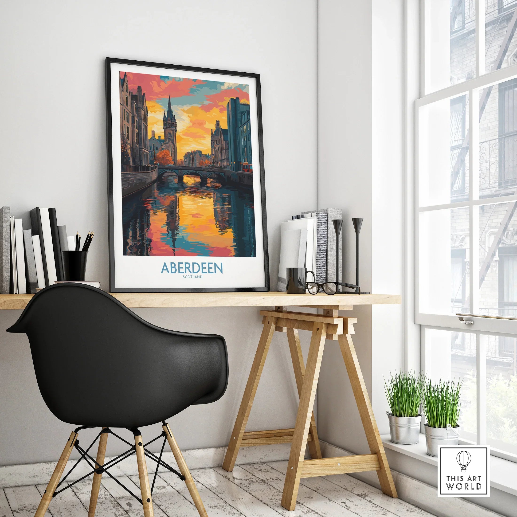 Aberdeen Scotland travel poster with vibrant sunset over canal, displayed on desk as wall art