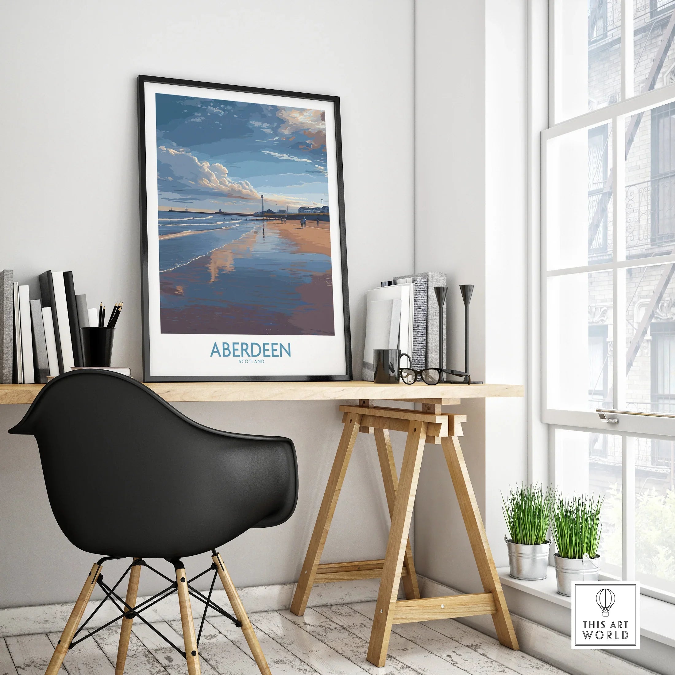 Aberdeen Scotland travel poster print featuring beach sunset, displayed on desk for home decor