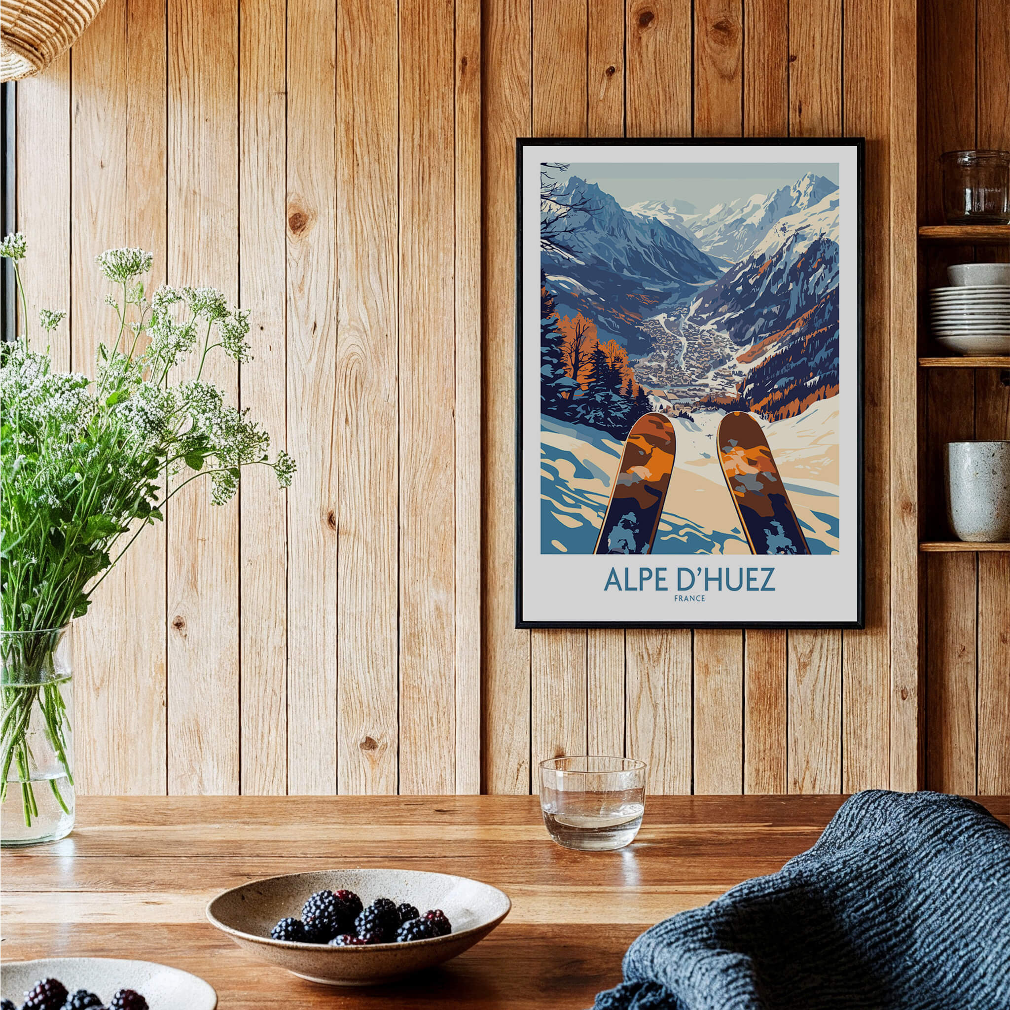 Alpe d'Huez Ski Poster showcasing stunning view of the French Alps with skis in the foreground.