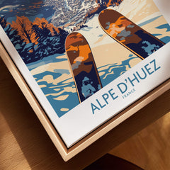 Alpe d'Huez Ski Poster featuring colorful skis and a stunning alpine backdrop, perfect for ski enthusiasts.
