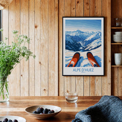 Alpe d'Huez Art Print Winter Sports showcasing stunning mountain views and ski equipment in a cozy setting.